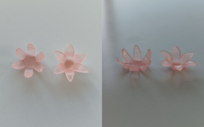 2 side by side photos of the same pieces from different angles. Left 2 flowers from pink sheet wax with folded up petals and the tips fold back. Left photographed from above, right photographed from the side so you can see the bend clearer  